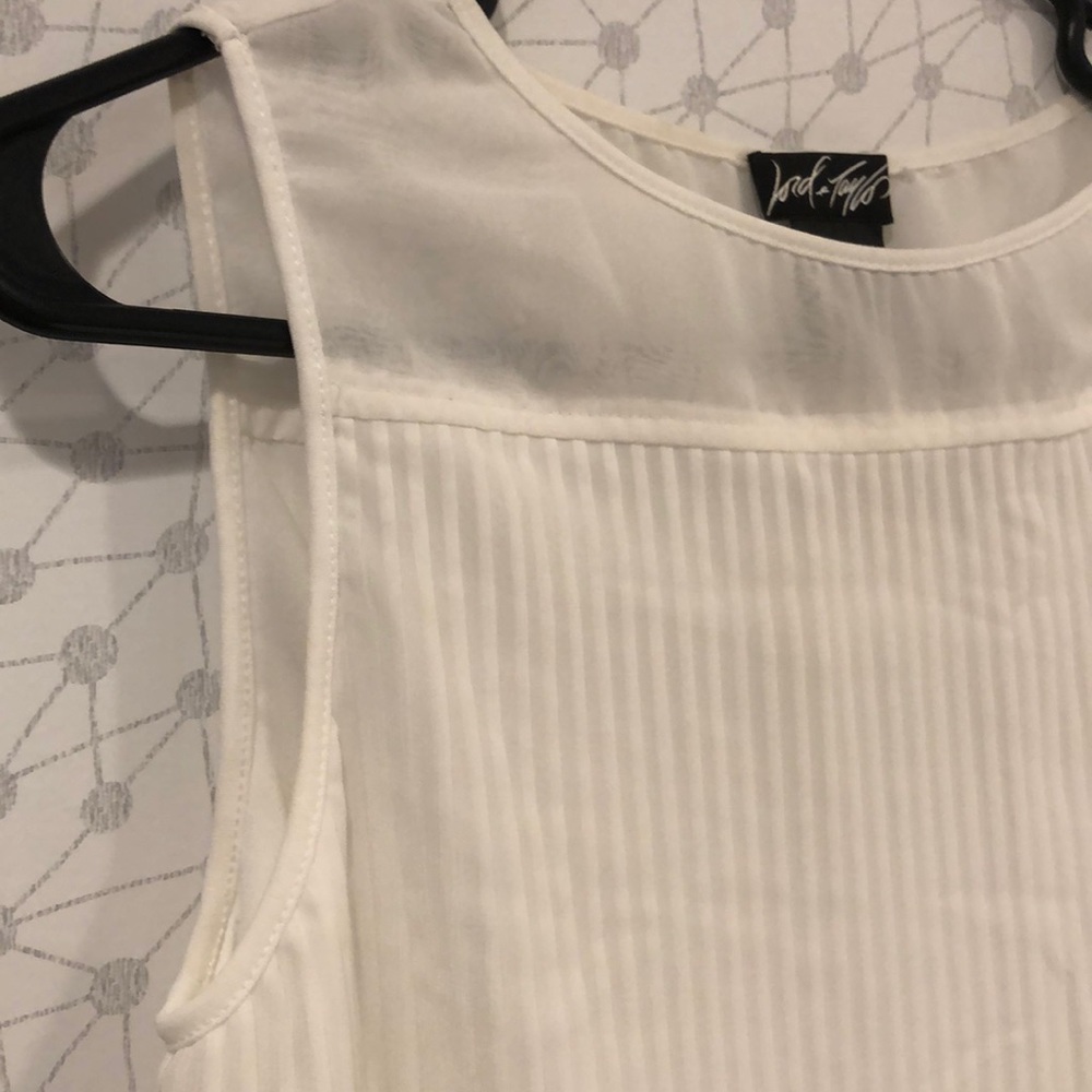 Ivory shell with draped folding